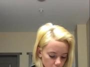 Perfect pale blonde playing with her big boobs