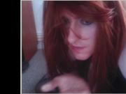 VenusSlut redhead crossdresser licking cum off hand