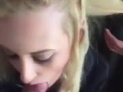 Blonde girl sucks cock while her is cut by the barber