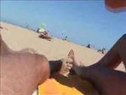 Handjob on beach with comeshot