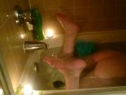 Masturbating Cougar in a Candle-lit Bath