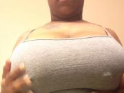 big titted ebony showing off her pierced nipples