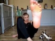 Teen smelling her feet after partying.