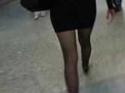 Candid sheer black pantyhose and miniskirt.