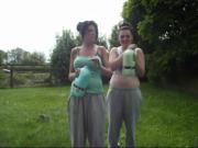 Two hot babes with big belly's do the milk challenge...