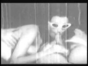 A hot brunette slut in sunglasses sucks a guy off and gets banged from the back