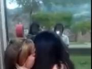 two hot teens kissing in puplic