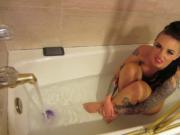 Sexy pornstar Christy Mack takes a bath