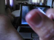 Cumming watching a video