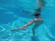 Woman receives wedgie underwater