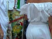 Under the dress of a mature brunette