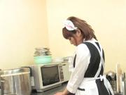 Hot maid masturbates in the kitchen with a toy