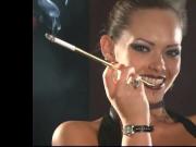 Sexy Leather Mistress smoking with holders