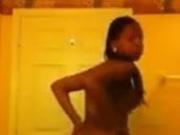 Ebony girl nude in bathroom.