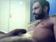 Argentine guy cums on his chest
