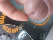 Jerking off cum in a pint glass