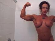 Female bodybuilder under the shower
