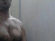 Cumming at shower cabin in army