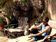 Sweet Adam Hess wanking in sunlight while lying outdoors