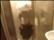 Wife showering.