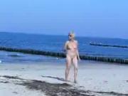 Cute hot granny fully naked at beach. Public nudity