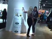 Two girls bare feet to the motor show
