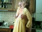 Mummy and daddy having fun in the kitchen. Stolen video
