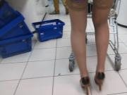 Girl in blue dress and tan stockings in supermarket 2