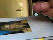 Cumming on Emma's picture and than I lick and swallow it