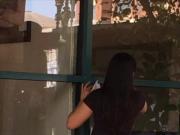 Cute Asian Girl Washing Windows