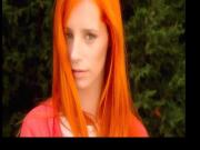 Orange haired beauty rubs herself