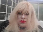 Smoking transvestite red lipstick