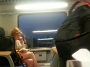 Flashing shy blonde nice girl in a train