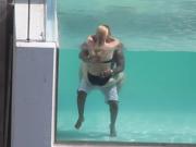 Interracial couple at the pool