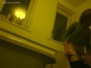 Young woman spied on hidden bathroom cam