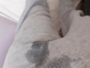 Piss in grey sweatpants