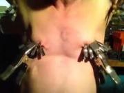 Sixteen clamps on the nipples and armpits