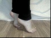 My bare feet on tip toes with french pedi