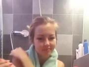 Showering teen uses her cell phone to make a movie