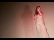 Chinese beauty sings naked on stage