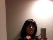 female mask in front of the mirror