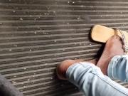 Candid ebony feet on bus