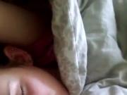 Boyfriend wakes his girlfriend with facial