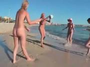 Nude Beach - Four Teens Play Volleyball