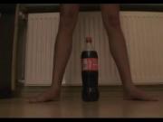 Tiny teen tries to ride a coke bottle