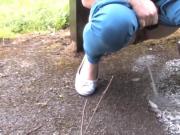 Girl Pissing At Roadside.