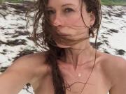 Rhona Mitra - topless on beach