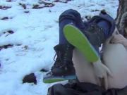 Cutie masturbating in the snow