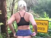 Blonde babe with purple skirt pisses a huge load in nature