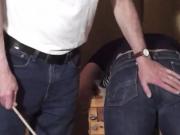 Caned over tight jeans Daddy boy